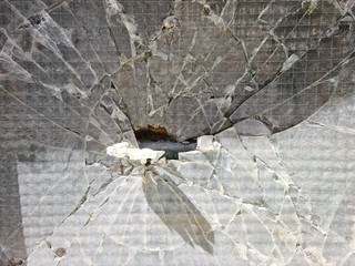 Cracked window in an abandoned house