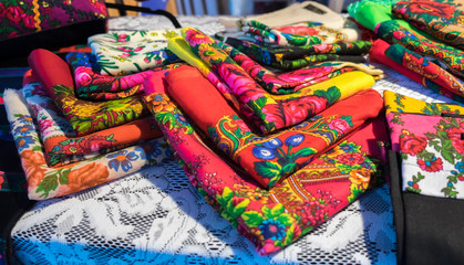 Fototapeta na wymiar Colorful scarves for sale at christmas tradition market. Budapest, Hungary