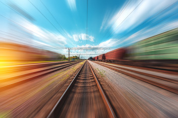 Fototapeta na wymiar freight, passenger train moves with speed by rail