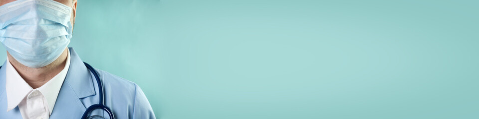 Doctor in professional medical suit with stethoscope and protective medic mask