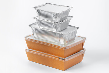 Assortment of food delivery containers on white background