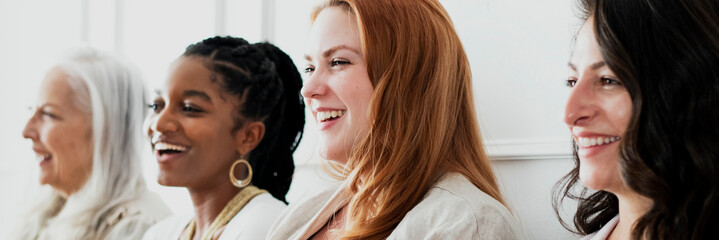 Happy gorgeous women standing together