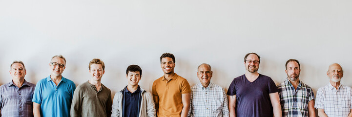 Cheerful diverse men standing in a line background
