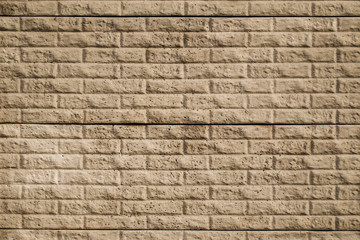 Decorative beige tiles brick wall texture 