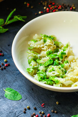 pasta creste di galli green sauce mint pesto Menu concept healthy eating. food background top view copy space for text healthy eating