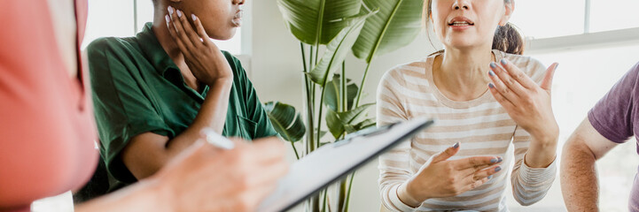 Diverse people in a supporting group session