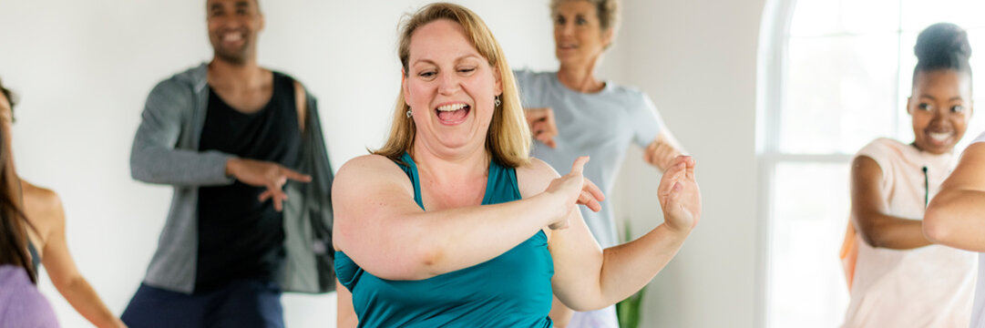People dancing in a fitness class