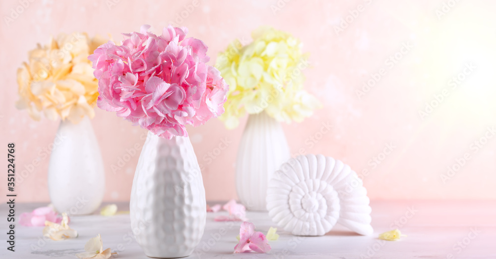 Poster Bouquets of beautiful hydrangea in vases