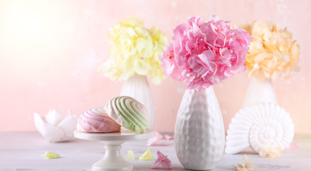 Fototapeta na wymiar Bouquets of beautiful hydrangea in vases