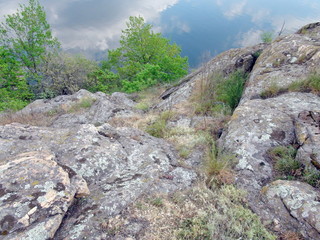 Amazing flowering spring vegetation makes even the old rocky bank of the Dnieper attractive for recreation.