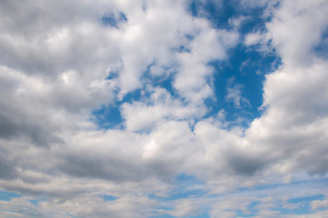 White clouds on a blue sky. Beautiful natural background.
