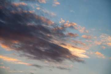 Naklejka na ściany i meble Beautiful sky with clouds at sunset. Beautiful natural background
