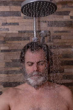 Older Man With Gray Beard, In The Shower