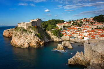 Fototapeta na wymiar Best view of Dubrovnik - Fortresses Lovrijenac and Bokar seen from old city walls . Croatia. South Dalmatia.