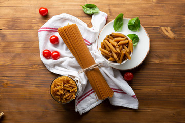 brown spaghetti and penne top view