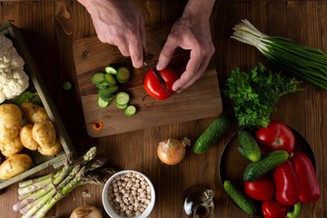 Men hands cooking vegan food