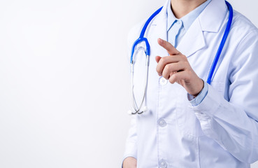 Female doctor body part with hand gesture, young woman physician with stethoscope isolated on white background, close up, cropped view, copy space