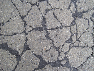 Obraz premium Asphalt road with cracks repaired