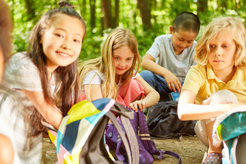 Fototapeta premium Multicultural children group with backpack