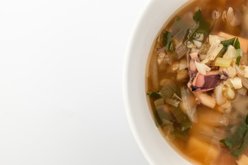 Squid soup on white background