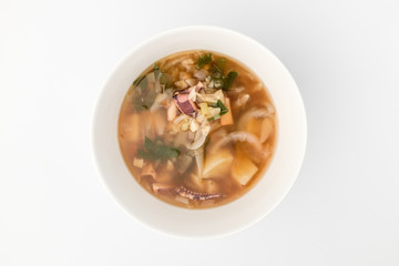 Squid soup on white background