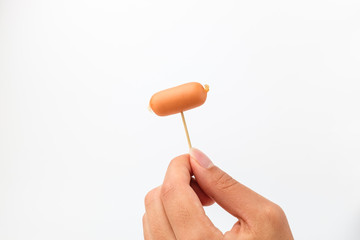 Cocktail sausage on white background