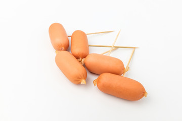Cocktail sausage on white background