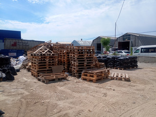 Packages with rubble and sand on construction site. Building materials base.