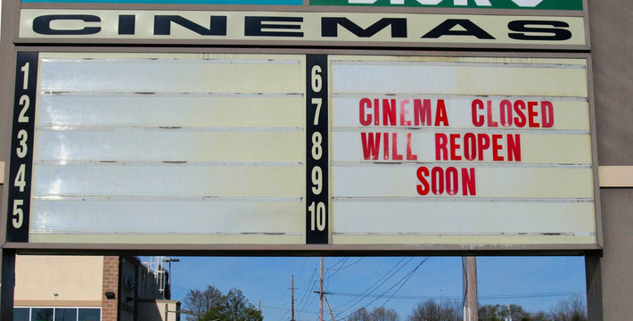 A Sign For An American Mall Multiplex Movie Theater Closed During The Covid-19 Outbreak Says Cinema Closed Will Reopen Soon In The Spring Of 2020