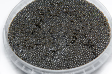black caviar in a plastic container