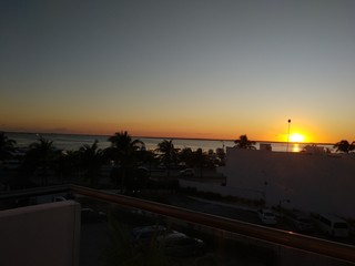 Sunset over the river in the center of Cancun