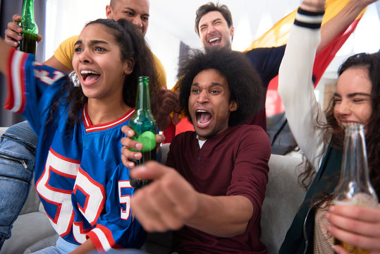 Excited fans celebrating the victory