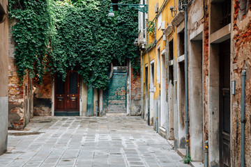 Fototapeta na wymiar Old town street European old houses in Venice, Italy