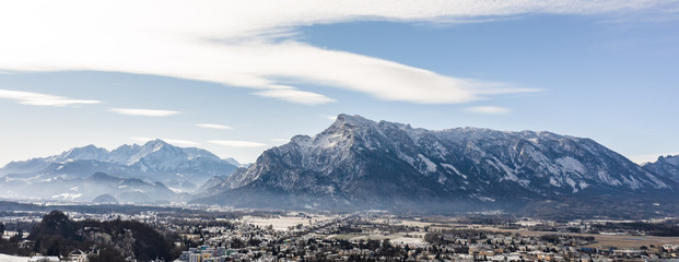 Aerial drone view of Salzburg snowy Unesberg mountain in winter morning