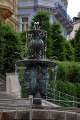 Historical architectural bas-relief fountain in the historical part of Karlovy Vary