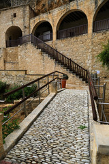 Fototapeta na wymiar walkway and bridge in Holy Monastery of Agios Neophytos, Cyprus