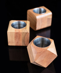 Wooden flowerpots isolated on black acrylic