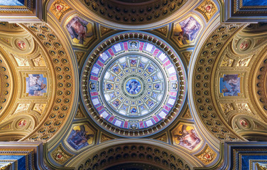 Fototapeta na wymiar Inside of St Stephens cathedral (Szent Istvan bazilika) in budapest Hungary. Amazing cupola with fantastic fresco. Built in 1868. Hungarian religious hearitage.