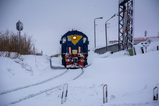 The train travels, there is a lot of snow around. Vorkuta, Komi Republic, Russia - March 7, 2020. Copy space