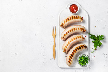 Grilled bratwurst sausages. Top view.