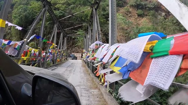 Bridge with prayer flags, Silk Route, Sikkim, India