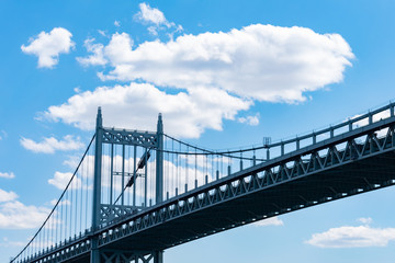 The Triborough Bridge of New York City with a Beautiful Cloud Filled Blue Sky
