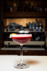 Stylish glass with a red cocktail.