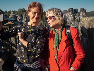 Fototapeta premium Two female women making a selfie