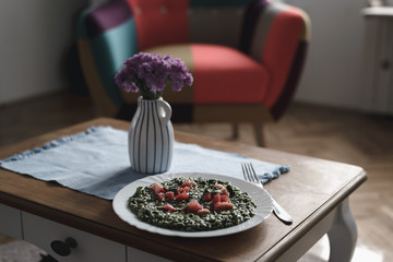 Plate of spinach risotto food.