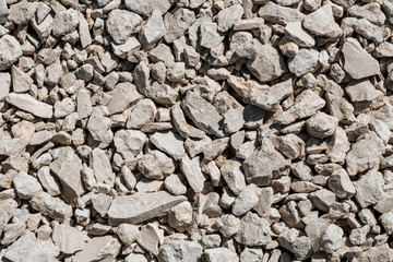 Background of gray crushed stone different forms