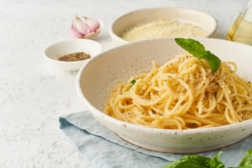 Cacio e pepe pasta. Spaghetti with parmesan cheese and pepper.