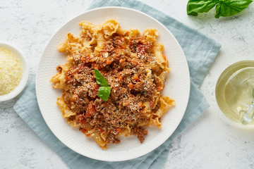 Pasta Bolognese campanelle with mincemeat and tomato sauce