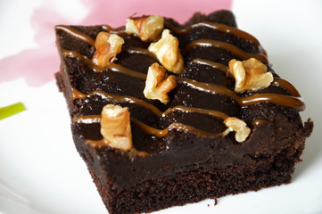 chocolate cake with walnuts. brownie cake. sweet dessert.