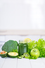 Detox smoothie cocktail with green fresh vegetables